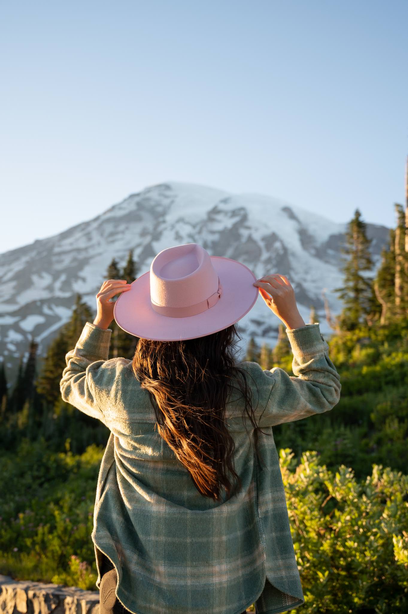 Pacific Northwest travel full time content creator wearing Lack of Color pink rancher hat